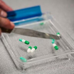 Close up of pills being counted