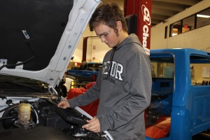 Student working on a truck