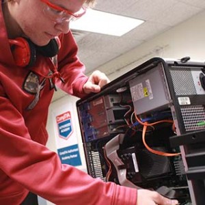 Student reparing a computer