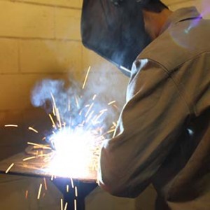 Close up of a welder and sparks