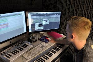 Student working on the sound room