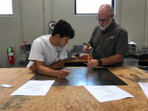 Sheet Metal Work with Student and Instructor
